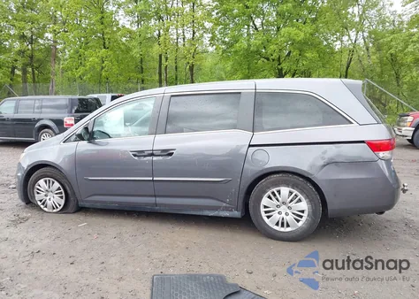 2014 Honda Odyssey Lx z USA, uszkodzony, nr VIN 5FNRL5H24EB129725